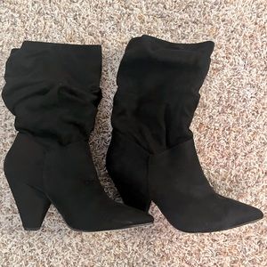 Mid shin black boots. 3 inch heel